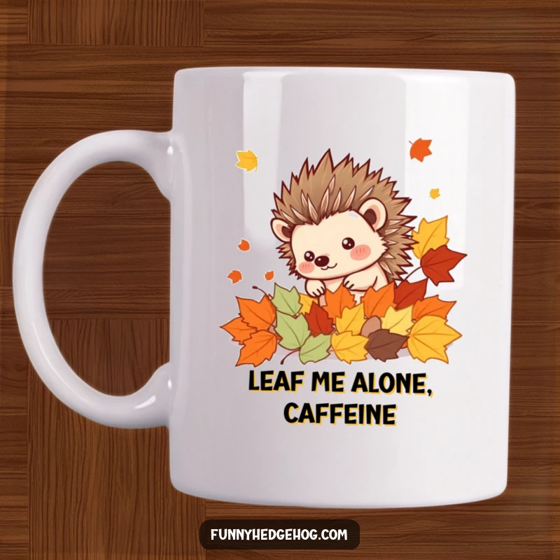 Funny Autumn Hedgehog Mug: Cute spiky kawaii hedgehog peeking playfully from a pile of cheerful autumn leaves, embracing the fall season.