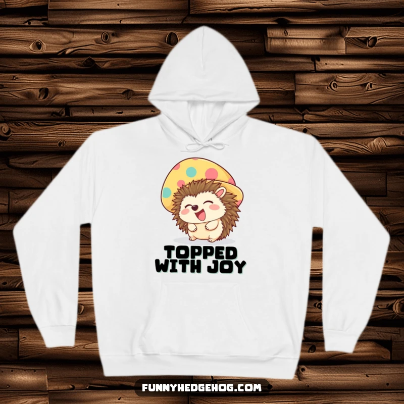 Funny hoodie with a giggling hedgehog sporting a large, colorful hat, offering warm, humorous comfort and style.